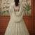 Beige Net Embroidered Lehengas