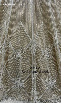 Beige Net Embroidered Lehengas 4