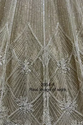 Beige Net Embroidered Lehengas