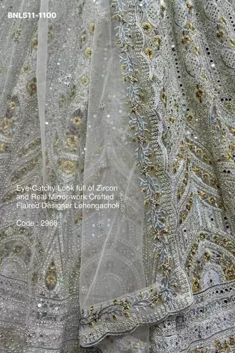Off White Net Embroidered Lehenga Set
