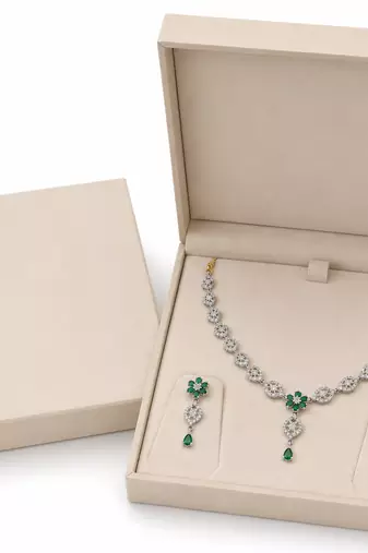 Silver-toned cz and emerald green floral necklace and earrings jewellery set, bridal wear