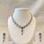 Silver-toned cz and emerald green floral necklace and earrings jewellery set, bridal wear