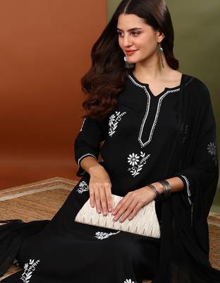 Women black rayon floral embroidered chikankari kurta with side pockets palazzo & dupatta 3