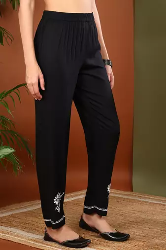 Women black rayon floral embroidered chikankari kurta with side pockets palazzo & dupatta