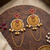 antique gold ruby pink kashmiri statement draping earrings