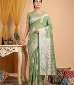 Light green colour linen cotton saree with woven butti & tassel pallu