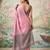 Light pink colour tissue silk saree with silver grey pallu & tassels