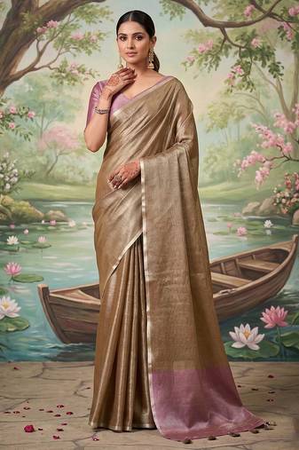 Brown colour tissue silk saree with silver grey pallu & tassels
