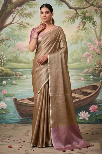 Brown colour tissue silk saree with silver grey pallu & tassels