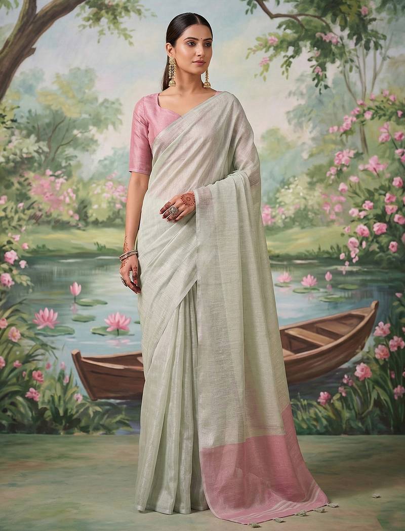Silver colour tissue silk saree with silver grey pallu & tassels
