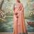 Peach colour tissue silk saree with silver grey pallu & tassels