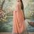 Peach colour tissue silk saree with silver grey pallu & tassels
