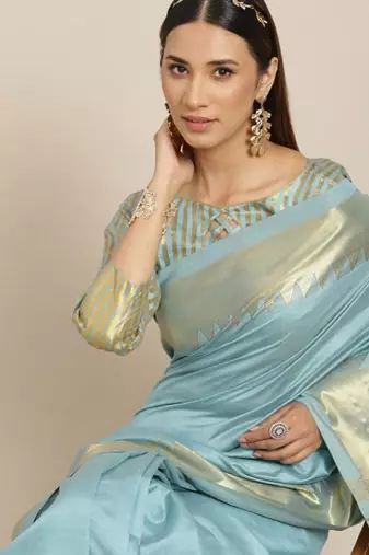 turquoise blue woven design silk blend kasavu saree with blouse