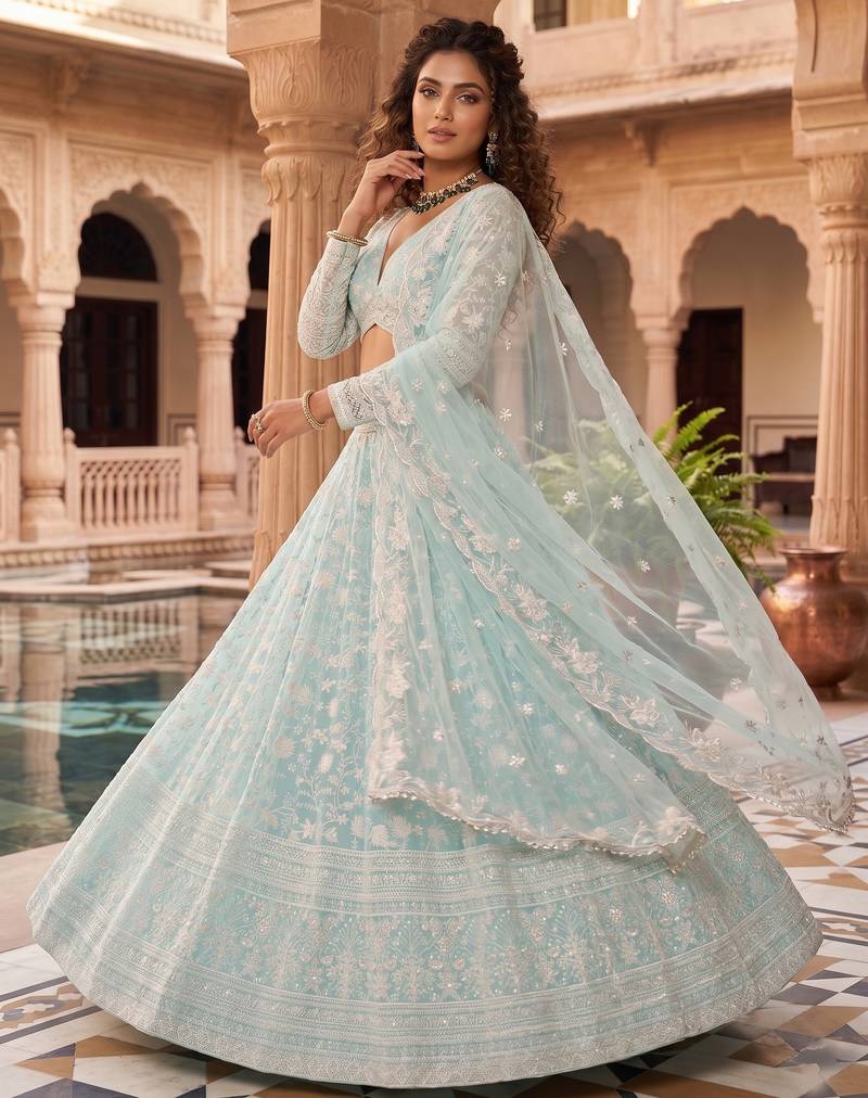 Awesome Thread Embroidered Sky Blue Net Lehenga Choli For Party