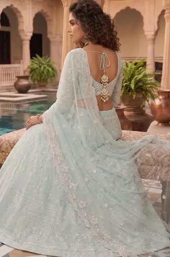 Awesome Thread Embroidered Sky Blue Net Lehenga Choli For Party