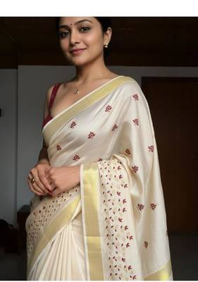 silver embroidered tissue kasavu saree with blouse piece 1