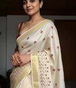 silver embroidered tissue kasavu saree with blouse piece
