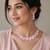 Baby pink ad stone rhodium-plated necklace set with earrings