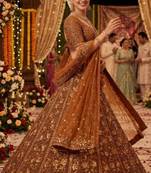 dark orange net embroidered lehenga choli