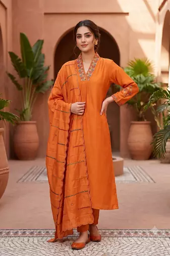 Orange  silk kurta pant set with scalloped dupatta