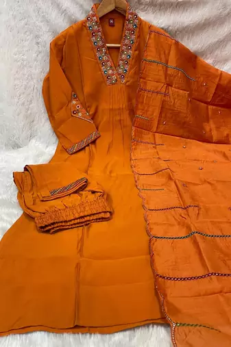Orange silk kurta pant set with scalloped dupatta