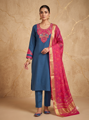 Women teal blue embroidered straight kurta with magenta dupatta and pant set 1