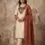 Women cream embroidered straight kurta with rust bandhani dupatta and pant set