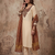 Women cream embroidered straight kurta with rust bandhani dupatta and pant set