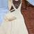 Women cream embroidered straight kurta with rust bandhani dupatta and pant set