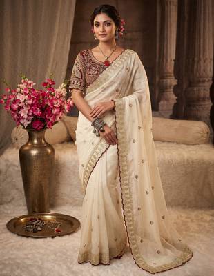 Premium off white saree with intricate embroidery & maroon heavy work blouse 1