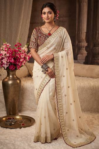 Premium off white saree with intricate embroidery & maroon heavy work blouse
