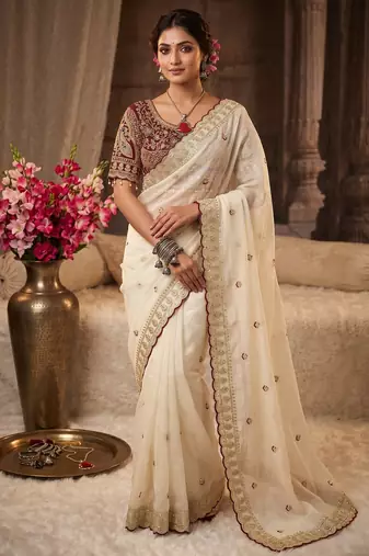 Premium off white saree with intricate embroidery & maroon heavy work blouse