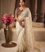 Premium off white saree with intricate embroidery & maroon heavy work blouse