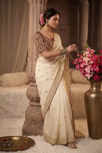 Premium off white saree with intricate embroidery & maroon heavy work blouse