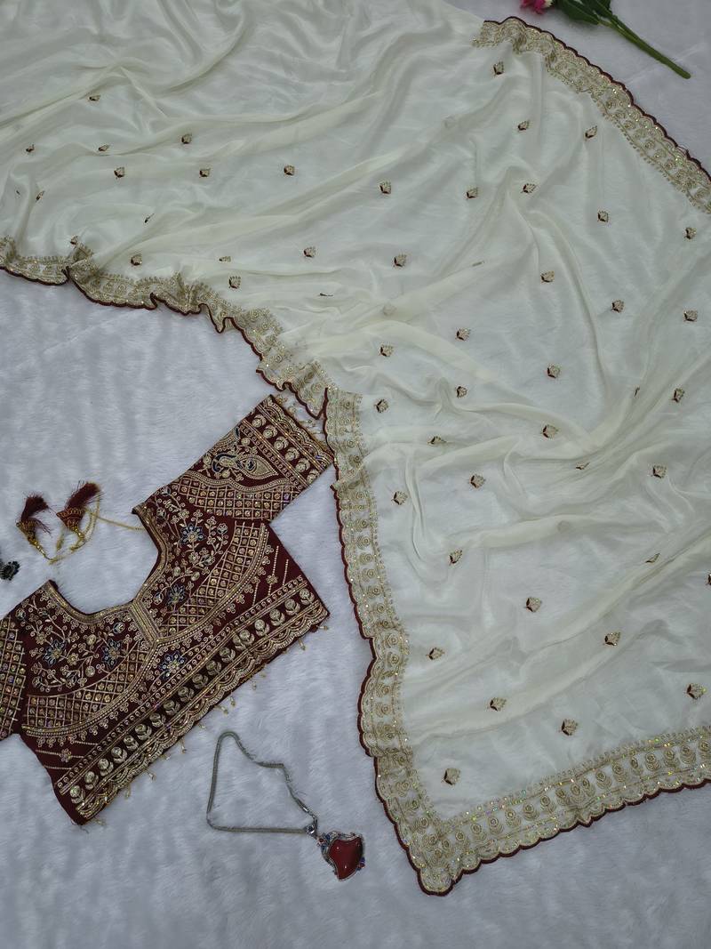 Premium off white saree with intricate embroidery & maroon heavy work blouse