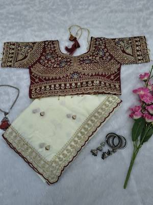 Premium off white saree with intricate embroidery & maroon heavy work blouse 5