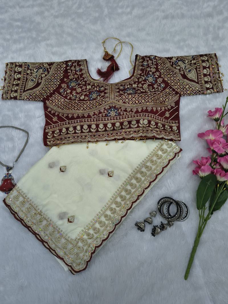 Premium off white saree with intricate embroidery & maroon heavy work blouse