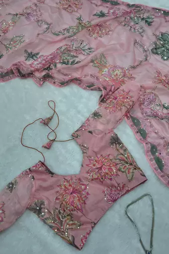 Premium floral print saree in dusty pink with stylish blouse