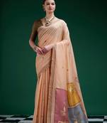 Peach handwoven saree with artistic floral patchwork pallu