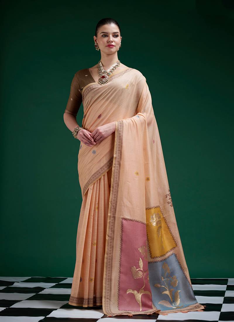 Peach handwoven saree with artistic floral patchwork pallu