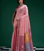 Pink handwoven saree with artistic floral patchwork pallu
