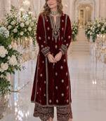 Maroon embroidered velvet salwar suit