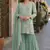 Green embroidered faux georgette sharara suit