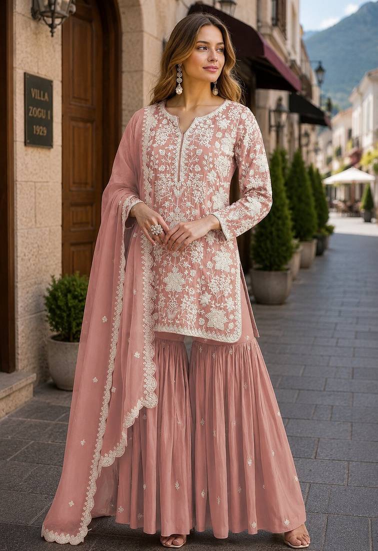 Peach embroidered faux georgette sharara suit