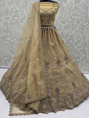 Royal Beige Zari Work Net Wedding Wear Lehenga Choli With Dupatta 4