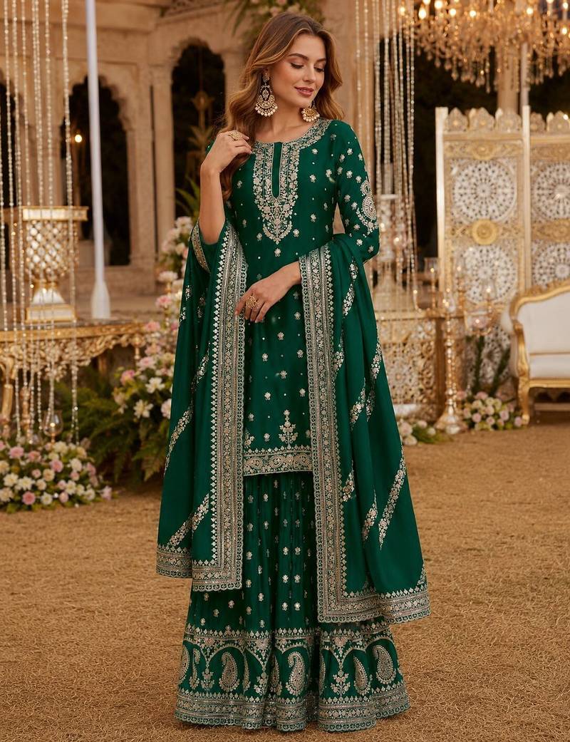 Green heavy vichitra silk suit with sequin & multi work