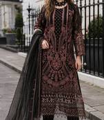 Black georgette suit with embroidered & multi thread zarkan work