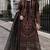 Black georgette suit with embroidered & multi thread zarkan work