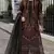 Black georgette suit with embroidered & multi thread zarkan work