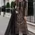 Black georgette suit with embroidered & multi thread zarkan work